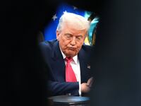 U.S. President Donald Trump answers questions from reporters