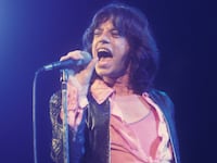 (MANDATORY CREDIT Watal Asanuma/Shinko Music/Getty Images) Mick Jagger of The Rolling Stones performs on stage at Earls Court, London, UK on 25th May 1976. (Photo by Watal Asanuma/Shinko Music/Getty Images)