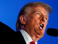 Former President Donald Trump speaks during a rally ahead of the New Hampshire primary election.