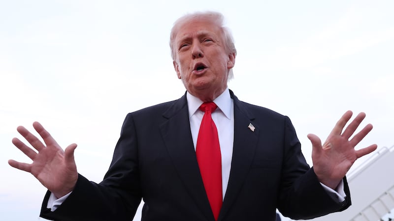 JOINT BASE ANDREWS, MARYLAND - NOVEMBER 09: U.S. President Donald Trump gives brief remarks to members of the press after exiting Air Force One on November 9, 2025 at Joint Base Andrews, Maryland. Trump spent the weekend at his Mar-A-Lago estate in Palm Beach, Florida. (Photo by Tasos Katopodis/Getty Images)