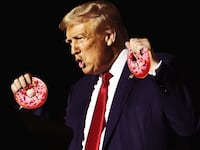 A photo illustration of Donald Trump shouting while holding two pink glazed donuts in both hands.