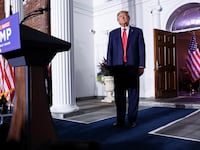 Former U.S. President Donald Trump walks onstage during an event following his arraignment on classified document charges
