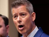 Transportation Secretary Sean Duffy with National Air Traffic Controllers Association President Nick Daniels during a news conference.
