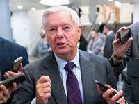 Sen. Lindsey Graham speaks to reporters in the Senate subway.