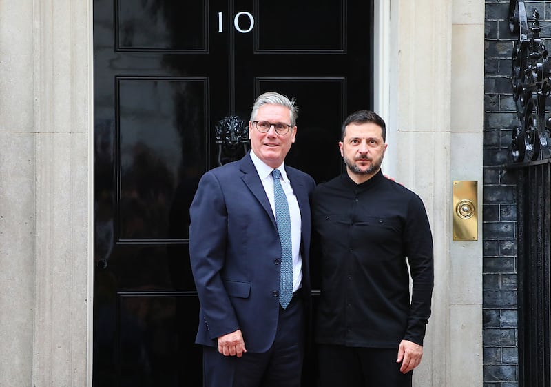 LONDON, ENGLAND - AUGUST 14: Britain's Prime Minister Keir Starmer greets Ukrainian President Volodymyr Zelenskyy at number 10 Downing Street on August 14, 2025 in London, United Kingdom. Zelenskyy's UK visit comes following his trip to Berlin to attend virtual meetings with European leaders and US President Trump to discuss the strategy for talks taking place between Trump and Russian President Vladimir Putin on Friday in Alaska, where they will discuss ending the war in Ukraine. (Photo by Alishia Abodunde/Getty Images)