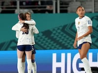 United States defender Kelley O'Hara (5) and midfielder Rose Lavelle (16) react after a group stage match against Portugal during the 2023 FIFA Women's World Cup at Eden Park.