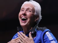 Wally Funk celebrating her land from space