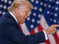 Republican presidential nominee and former U.S. President Donald Trump gestures during a rally with his vice presidential running mate U.S. Senator JD Vance in St. Cloud, Minnesota, U.S., July 27, 2024.