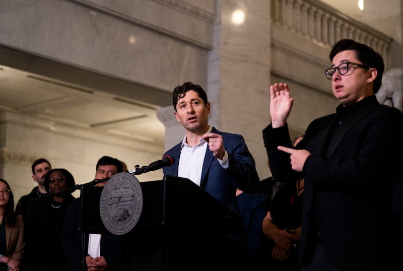 MINNEAPOLIS, MINNESOTA - JANUARY 09: Minneapolis Mayor Jacob Frey (C) speaks during a press conference at City Hall on January 09, 2026 in Minneapolis, Minnesota. Frey and local city officials are calling on federal investigators to turn over information to the Minnesota Bureau of Criminal Apprehension after the shooting death of Renee Good by a federal officer this week. (Photo by Stephen Maturen/Getty Images)