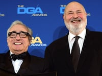 Rob Reiner flanks Martin Scorsese posing with his trophy For Outstanding Directorial Achievement in Feature Film "The Wolf Of Wall Street" in the press room at the 66th Annual Directors Guild of America Awards January 25, 2014 at the Hyatt Regency Century Plaza in Century City, California. AFP PHOTO FREDERIC J. BROWN (Photo credit should read FREDERIC J. BROWN/AFP via Getty Images)