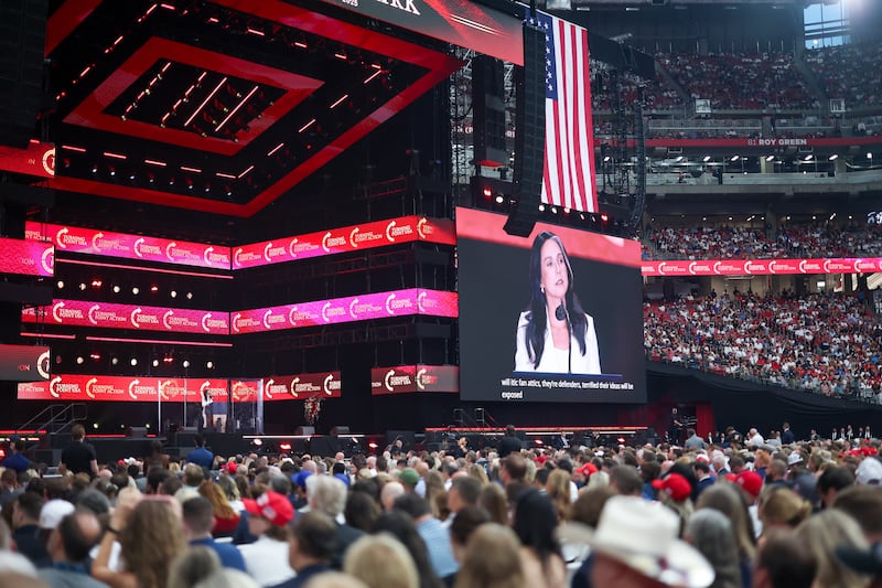 GLENDALE, ARIZONA - SEPTEMBER 21: Director of National Intelligence Tulsi Gabbard speaks during the memorial service for political activist Charlie Kirk at State Farm Stadium on September 21, 2025 in Glendale, Arizona. Kirk, the CEO and co-founder of Turning Point USA, was shot and killed on September 10th while speaking at an event during his "American Comeback Tour" at Utah Valley University. (Photo by Eric Thayer/Getty Images