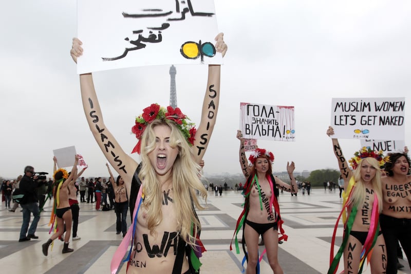 articles/2013/03/30/can-bare-breasts-save-tunisia/130329-giovanni-femen-tunisia-tease_qieodo