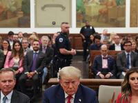 Former U.S. President Donald Trump appears in the courtroom with his lawyers