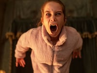 A photo still of Alisa Weir in 'Abigail'