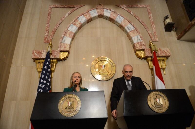 articles/2012/11/21/america-and-this-ceasefire/clinton-egypt-openz_m5msyz