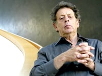 US minimalist composer Philip Glass poses on 05 September 2005 at the theatre of Erfurt, eastern Germany. He composed for the theatre the opera titled "Waiting for the Barbarians" that will have its world premiere on 10 September 2005 in the eastern German town.