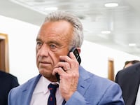 WASHINGTON, DC - DECEMBER 18: Robert F. Kennedy Jr., President-elect Donald Trump's nominee to be Secretary of Health and Human Services speaks on the phone as he walks through the Dirksen Senate Office Building on December 18, 2024 in Washington, DC. Trump's nominees for his incoming administration continue to meet with senators on Capitol Hill, weeks before his inauguration. (Photo by Anna Moneymaker/Getty Images)