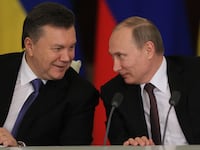 Russian President Vladimir Putin (R) and former President of Ukraine Viktor Yanukovych.