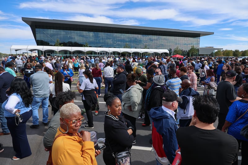 People wait in line for a rally with former US President Barack Obama in support of US Senator Jon Ossoff's reelection campaign at The Arena at Southlake in Morrow, Georgia, on October 28, 2026. Early voting is underway in Georgia ahead of the November 3 general election, with Ossoff facing Republican Mike Collins and Lance Bottoms facing Rick Jackson in the gubernatorial race.