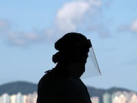 2020-07-27T084032Z_365842368_RC2K1I9HOJFH_RTRMADP_3_HEALTH-CORONAVIRUS-HONGKONG_ng1h2b