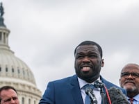 Recording artist Curtis "50 Cent" Jackson, Representative Troy Carter (D-LA), and Attorney Ben Crump speak during a press conference near the U.S. Capitol after meeting with lawmakers
