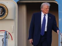 Donald Trump exits Air Force One.