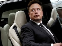 Elon Musk gets in a Tesla car as he leaves a hotel in Beijing, China May 31, 2023.