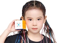 Lian Yunzhi, 6, has broken the women’s world record for solving a Rubik’s Cube.