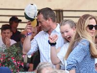 Peter Phillips and his daughter Savannah Phillips along with Peter's new girlfriend, nurse Harriet Sperling (in a blue dress) on May 12, 2024 in Badminton, Gloucestershire.