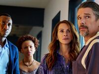 Mahershela Ali as G.H., Myha’la Herrold as Ruth, Julia Roberts as Amanda and Ethan Hawke as Clay in the film Leave the World Behind on Netflix