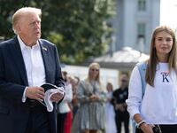WASHINGTON, DC - SEPTEMBER 26: U.S. President Donald Trump, joined by his granddaughter Kai Trump, departs the White House on September 26, 2025 in Washington, DC. Under pressure from Trump, the DOJ indicted former FBI Director James Comey on counts of making false statements and obstruction of a congressional proceeding related to the September 2020 Russia investigation. (Photo by Kevin Dietsch/Getty Images)