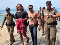 Convicted murderer Daniel Sancho Bronchalo is escorted by Thai police in August 2023.