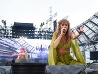 Taylor Swift performs on stage