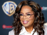 Oprah Winfrey, promoting the movie The Color Purple, attends a Warner Bros. presentation during CinemaCon.
