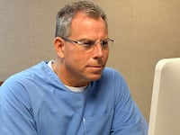 Erik Menendez appears before the parole board via teleconference at the Richard J. Donovan Correctional Facility on August 21, 2025, in San Diego. Menendez was denied release more than 36 years after he and his brother Lyle killed their parents in their Beverly Hills mansion. Lyle appears before the board Friday.