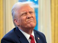 U.S. President Donald Trump reacts to a reporter's question from the Resolute Desk after signing an executive order to appoint the deputy administrator of the Federal Aviation Administration in the Oval Office at the White House on January 30, 2025 in Washington, DC.