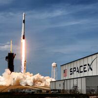 The SpaceX Falcon 9 rocket carrying astronauts Doug Hurley and Bob Behnken in the Crew Dragon capsule lifts off from Kennedy Space Center, Fla.