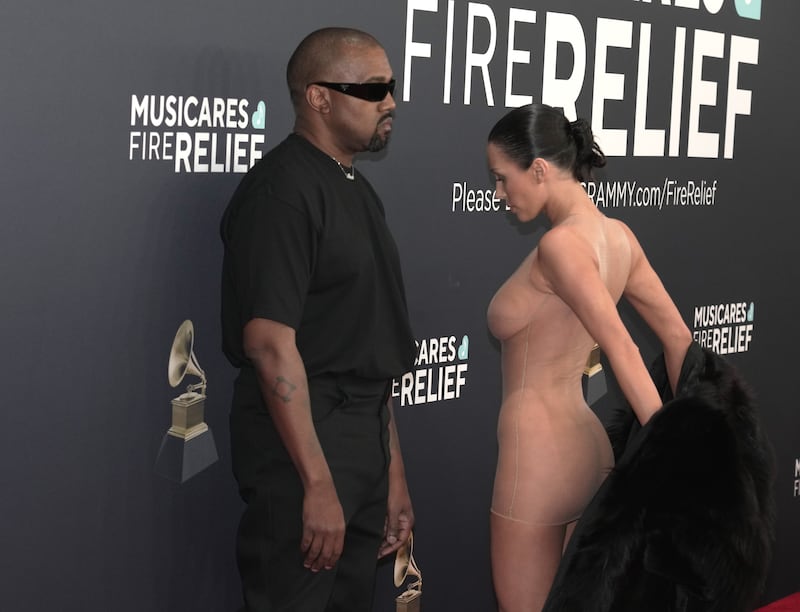 LOS ANGELES, CALIFORNIA - FEBRUARY 02: (FOR EDITORIAL USE ONLY) (EDITORS NOTE: This image contains nudity.) (L-R) Kanye West and Bianca Censori attend the 67th GRAMMY Awards at Crypto.com Arena on February 02, 2025 in Los Angeles, California. (Photo by Jeff Kravitz/FilmMagic)