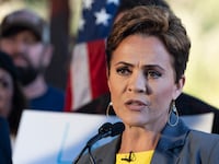 Arizona Republican U.S. Senate candidate and far-right election denier Kari Lake speaks during a news conference with Sen. John Barrasso (R-WY) on Feb. 29, 2024, in Phoenix, Arizona.