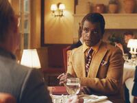 Capote and James Baldwin sit for dinner in a still for ‘Feud: Capote vs. The Swans’