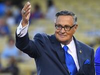LOS ANGELES, CA - SEPTEMBER 21: Longtime Los Angeles Dodgers broadcaster Jaime Jarrin acknowledges the crowd after being inducted into the Dodger Stadium Ring of Honor the game against the San Diego Paders at Dodger Stadium on September 2, 2018 in Los Angeles, California. (Photo by Jayne Kamin-Oncea/Getty Images)