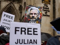 Supporters for Julian Assange rally outside a British courthouse.
