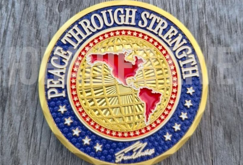 A commemorative coin reportedly given to Putin