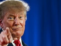 U.S. President Donald Trump points during a midterm election campaign rally at Sioux Gateway Airport in Sioux City, Iowa, on October 22, 2026.