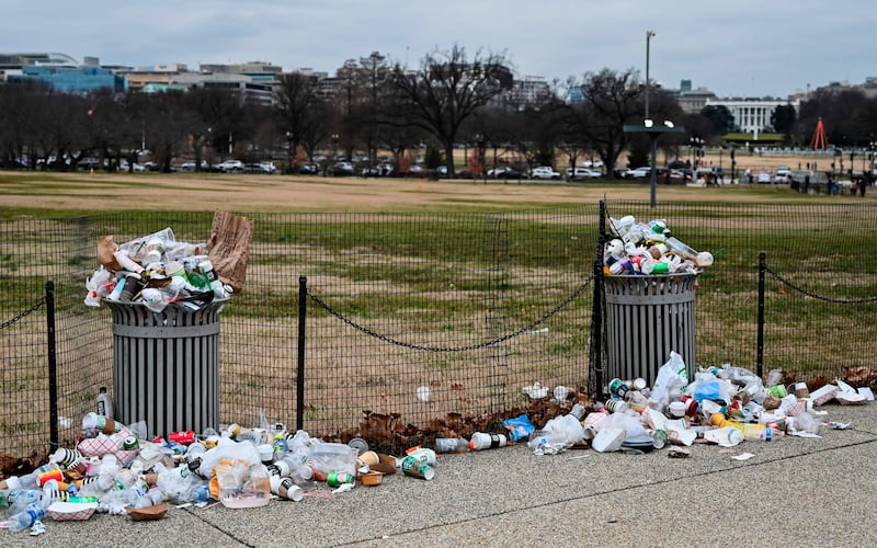 The White House is seen in the background, as trash lays uncollected on the National Mall due to the partial shutdown of the US government on January 2, 2019