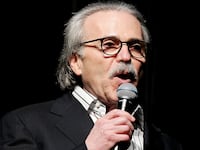 David Pecker, Chairman and CEO of American Media speaks at the Shape and Men's Fitness Super Bowl Party in New York City, U.S., January 31, 2014.