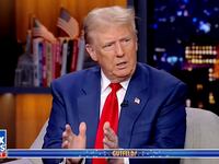 A seated Donald Trump speaks during an appearance on Fox News talk show 'Gutfeld!'