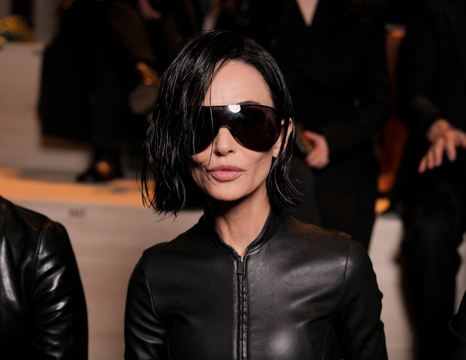 Demi Moore surprised fans with a short bob haircut at the 2026 Gucci Fall/Winter fashion show.