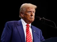 Republican presidential nominee, former U.S. President Donald Trump delivers remarks during a campaign rally at the Cobb Energy Performing Arts Centre on October 15, 2024 in Atlanta, Georgia.