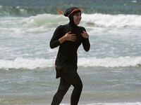articles/2016/08/15/france-s-burqini-bans-use-same-reasoning-as-fundamental-islam/160814-Dickey-Burqini-ban-tease_brwuy4